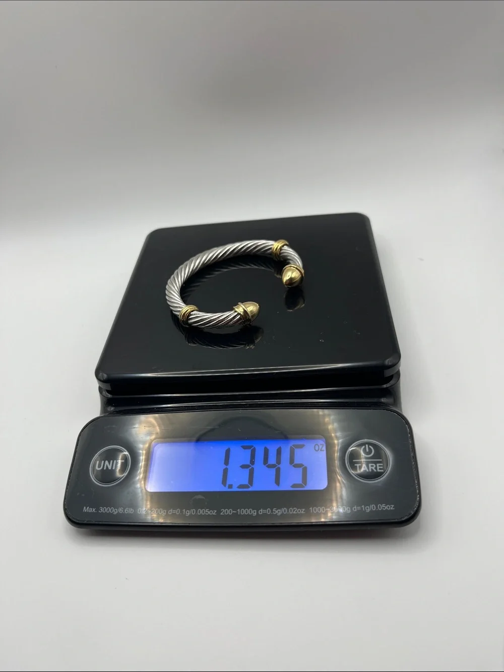 Silver-Tone Twisted Cable Cuff Bracelet with Gold Tone Accents